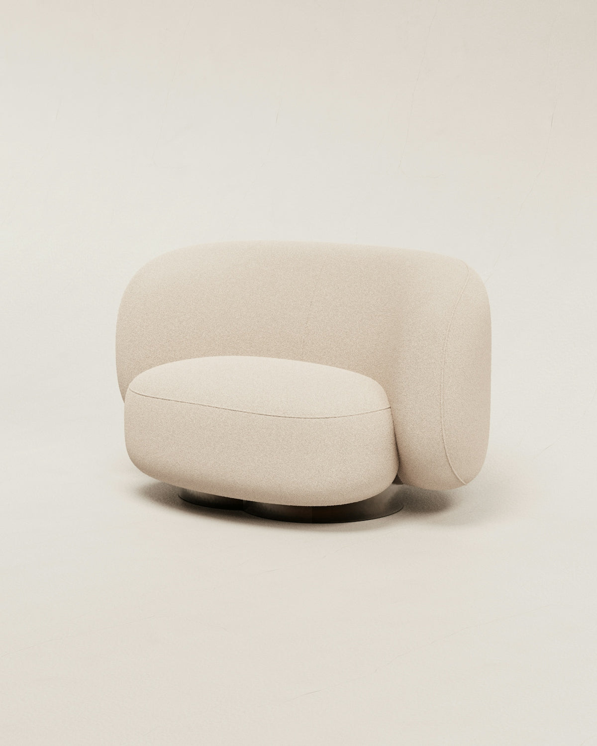 a white couch sitting on top of a white floor Image